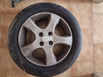 Cerchi in lega + gomme 185/60 R15