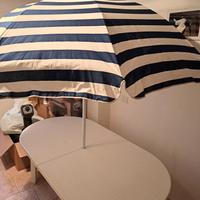 Tavolo da giardino allungabile con ombrellone