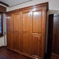 Camera da letto con armadio in legno massello