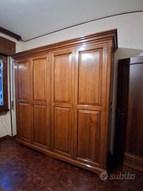 Camera da letto con armadio in legno massello