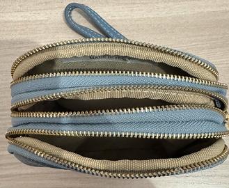 Pochette a mano in vera pelle con tre scomparti