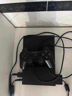 PlayStation 2 con giochi originali