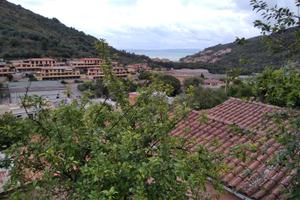 Rustico con terreno a Porto S. Stefano