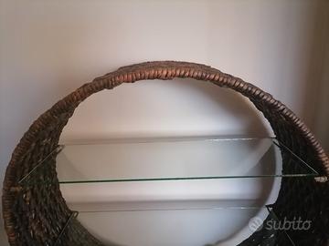 libreria tonda con mensole di vetro 