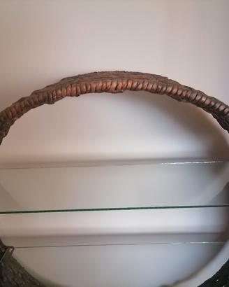 libreria tonda con mensole di vetro 