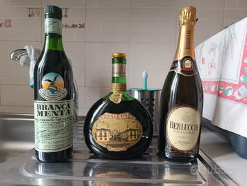 Tris di Bottiglie D'Epoca