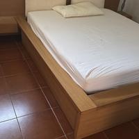 Camera da letto habitat in legno.