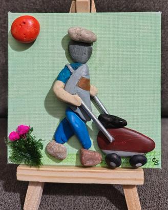 Quadretto con i sassi: "Il giardiniere"