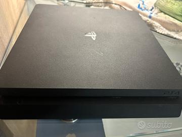 Ps4 slim 1 Tera  + giochi