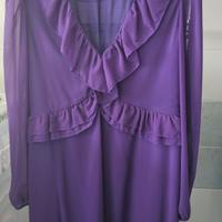 abito elegante con maniche trasparenti