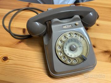 Telefono vintage cornetta con filo da collezione