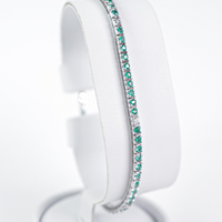 Bracciale tennis con smeraldi e diamanti