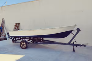 Barca 4 mt + motore Mariner 15 cavalli + carrello