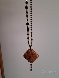 Collana perline lunga con pendente 