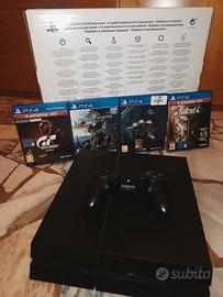 PS4 console + joypad + 4 giochi con scatola