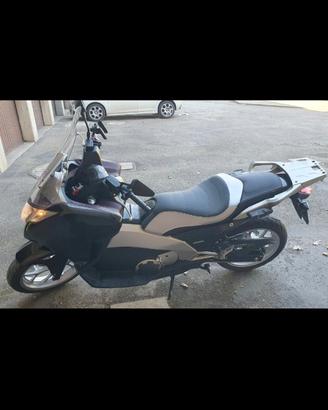 Scuotere