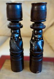 Coppia di 2 statuette-candelieri in ebano