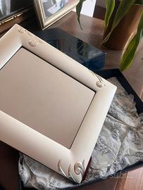 Cornice argento