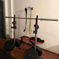 Bilancere olimpico, rack, panca, bumpers, tappeto