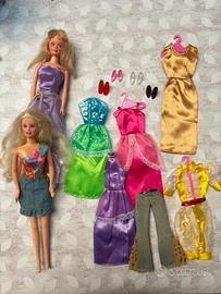 2 Barbie con set di vestiti