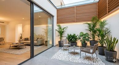 Loft di Design con Studio Indipendente e Giardino