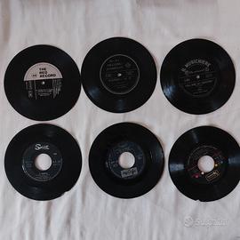 Lotto 11 dischi in vinile 45 giri autori vari