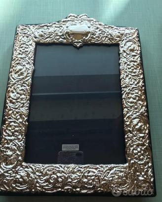 Cornice in argento