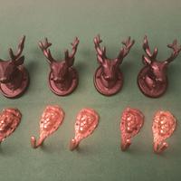 APPENDIABITI D'EPOCA TESTA LEONE E CERVO