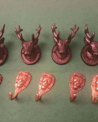 APPENDIABITI D'EPOCA TESTA LEONE E CERVO