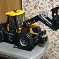 trattore forestale Bruder con attrezzi 