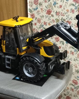 trattore forestale Bruder con attrezzi 