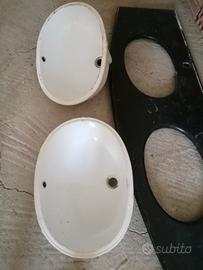 Piano in marmo con lavabi 