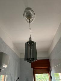 Coppia di lampadari in acciaio e vetro fumè