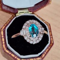 Anello con Topazio e Moissaniti