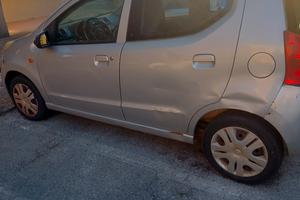 Nissan Pixo per disabili con comandi al volante