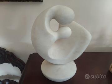 statua 