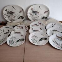 Servizio in ceramica inglese di piatti da pesce.