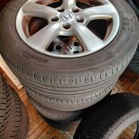 4 ruote complete  205 55 16 cerchi in lega HL 4243