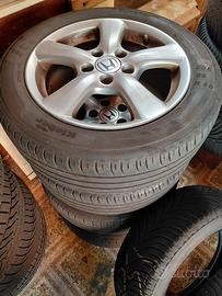 4 ruote complete  205 55 16 cerchi in lega HL 4243