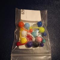 12 piercing ombelico in plastica 