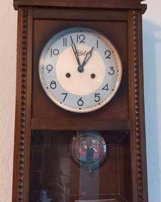 Orologio da parete a pendolo vintage