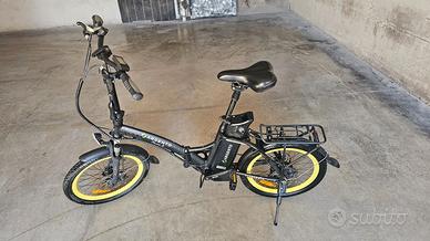 Bicicletta elettrica argento piuma + come nuova