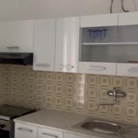 Mobili di cucina colore bianco.