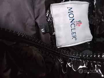 Giubbotto nero smanicato 