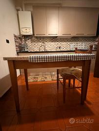 cucina completa  colore oro .