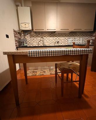 cucina completa  colore oro .