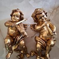 Putti in legno dorati 