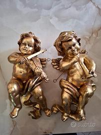 Putti in legno dorati 