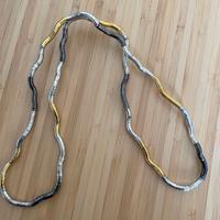 Collana-bracciale flessibile bronzo-oro