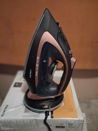 ferro da stiro a vapore